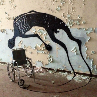Illustration for article titled How do you make an abandoned asylum even creepier? Add eerie shadows